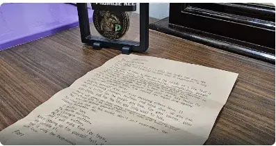 FitwithPari Show-Up Champion medal with Pari's handwritten letter