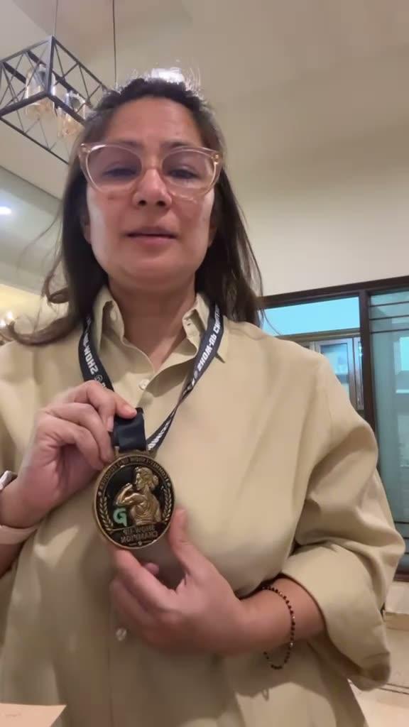 Ankur with her Show-Up Champion medal