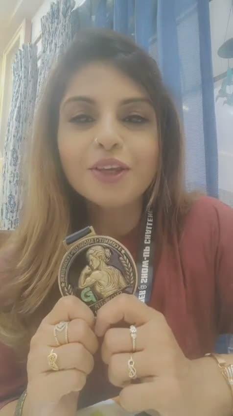 Inshiya with her Show-Up Champion medal